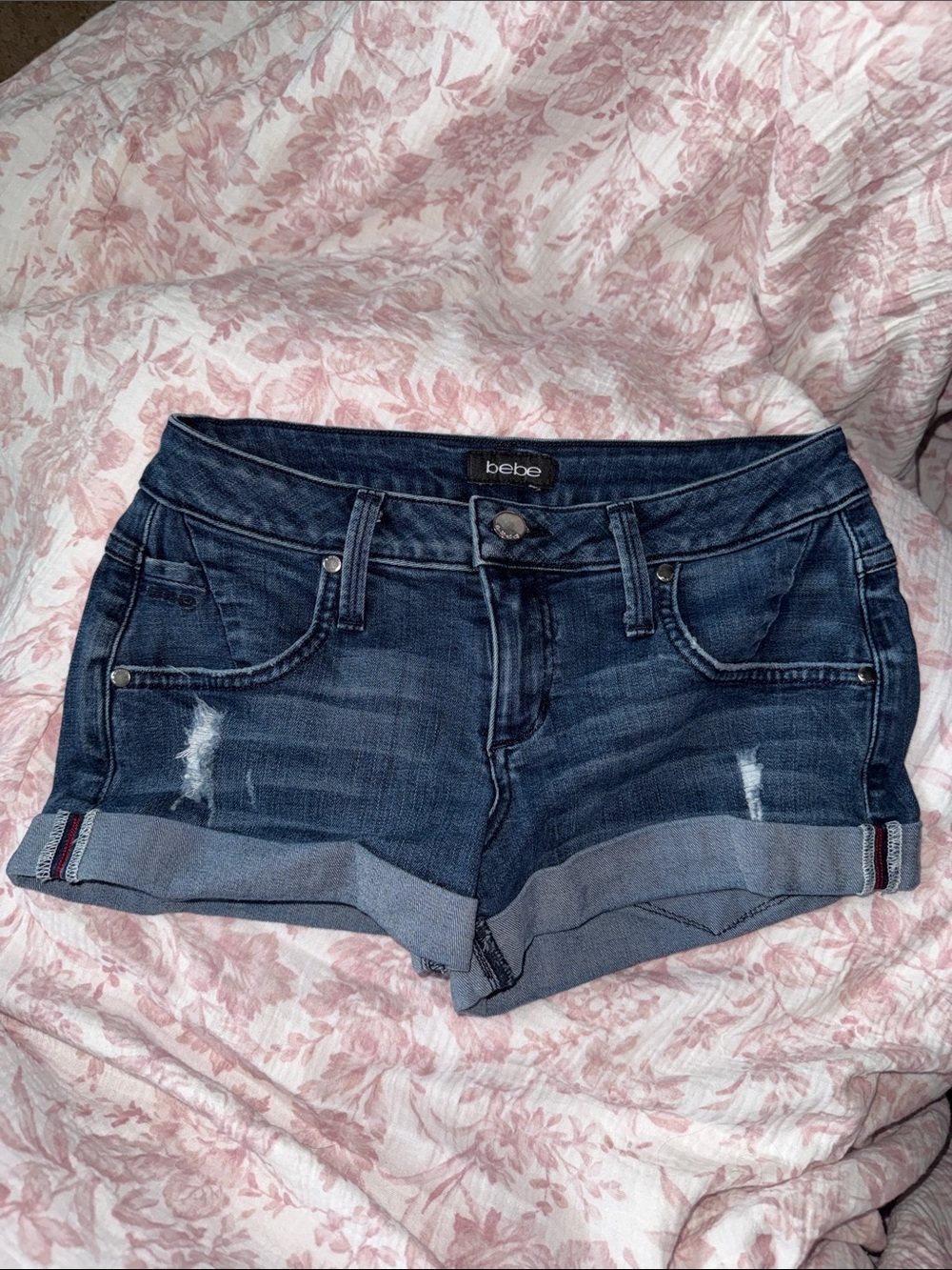 bebe Indigo Distressed Rolled Hem Denim Shorts